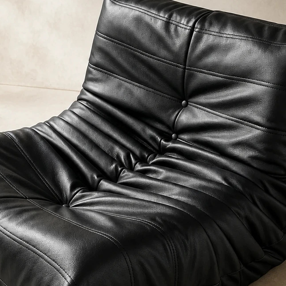 Black microfiber leather upholstery texture detail