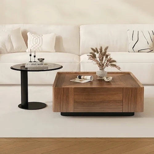 Low-profile square walnut veneer coffee table in a bright interior