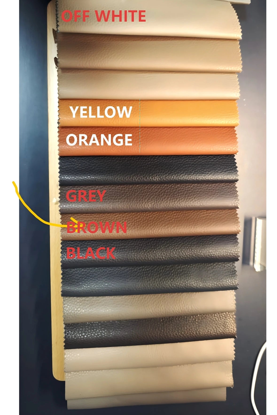 Microfiber leather colour swatch photo - Brown, Grey, Off White, Black, Yellow and Orange; all colours priced equally