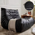 Black low profile lounge module with matching throw