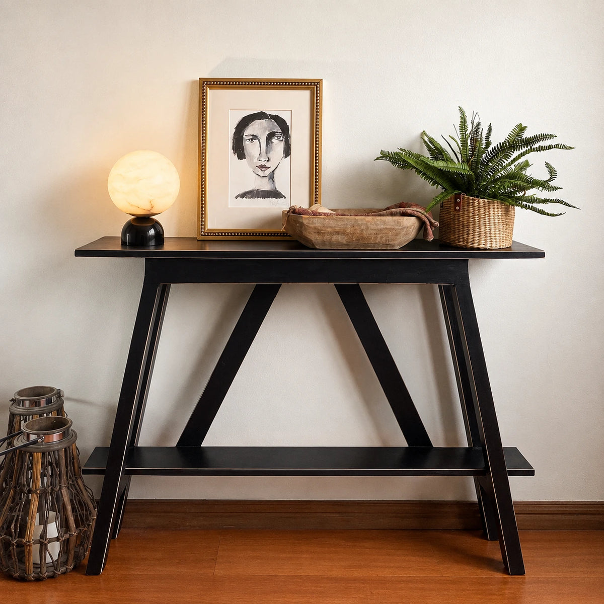 The pale veined globe stands out against a dark entry console.