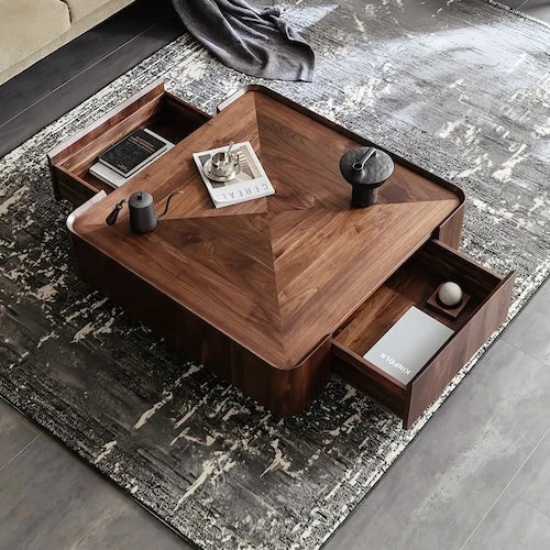 Low-profile walnut veneer coffee table with both storage drawers open
