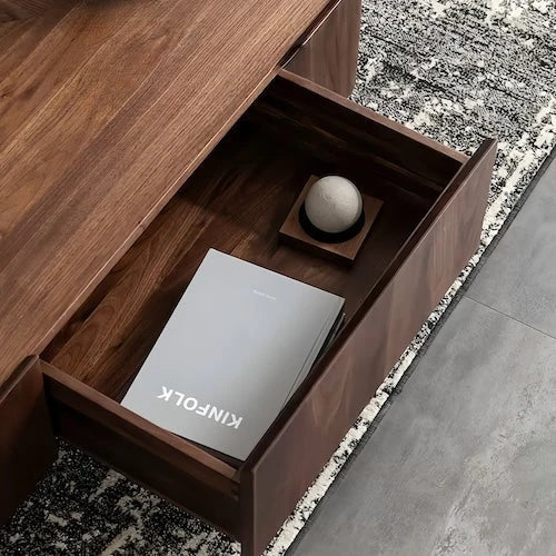Open storage drawer on the walnut veneer coffee table