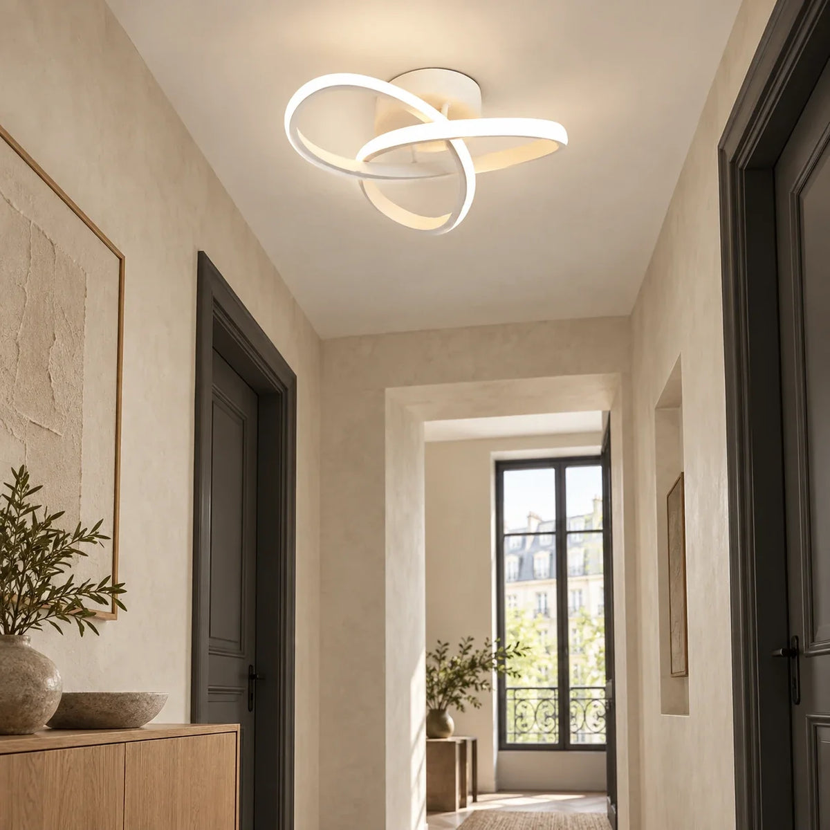Ivory loop ceiling light in a European entry hall; styling illustration